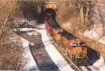 All rail ore loads cruise east out of the tunnel